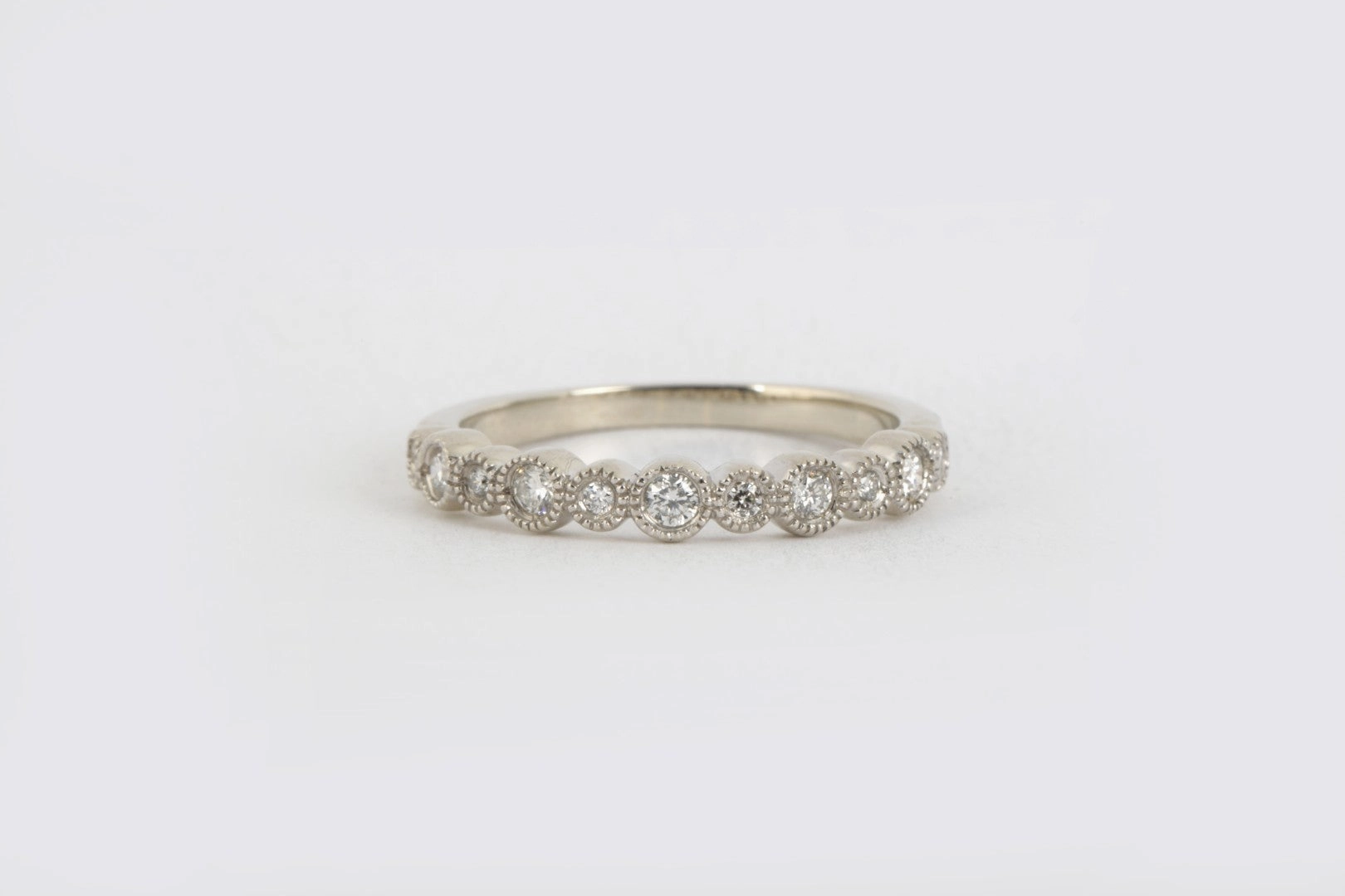 14k White Gold 0.21tcw Diamond Half Eternity Wedding Band Size 6.5 (2.59g.)