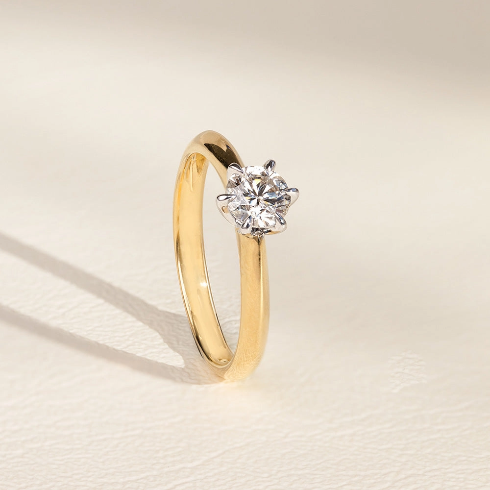 18ct 0.70 Carat Diamond Solitaire Ring with 6 Claw Knife Edge Setting