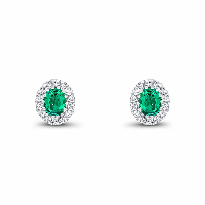 18ct white gold oval emerald and brilliant cut claw set stud earrings