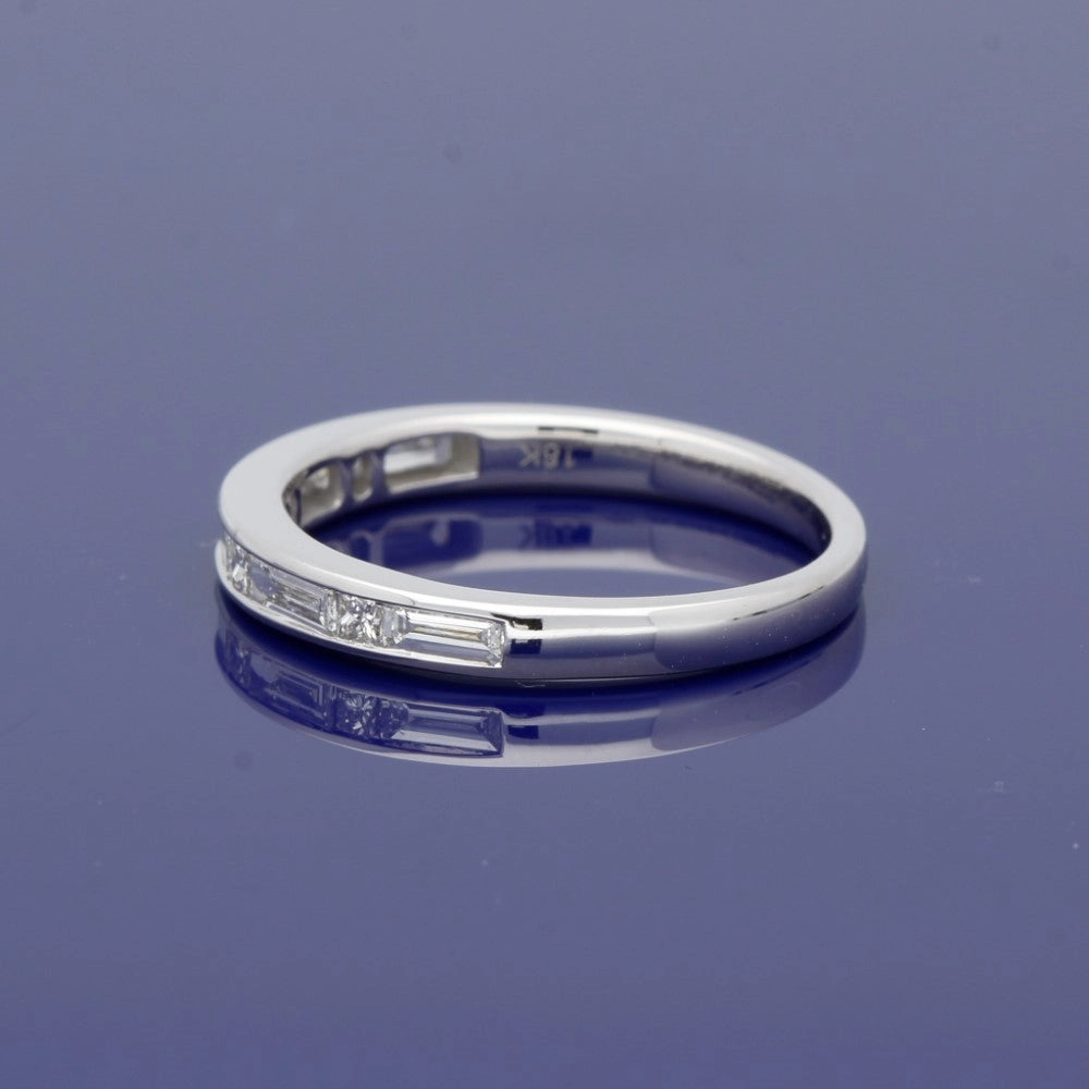 18ct White Gold Princess and Baguette Cut Diamond Half Eternity Ring