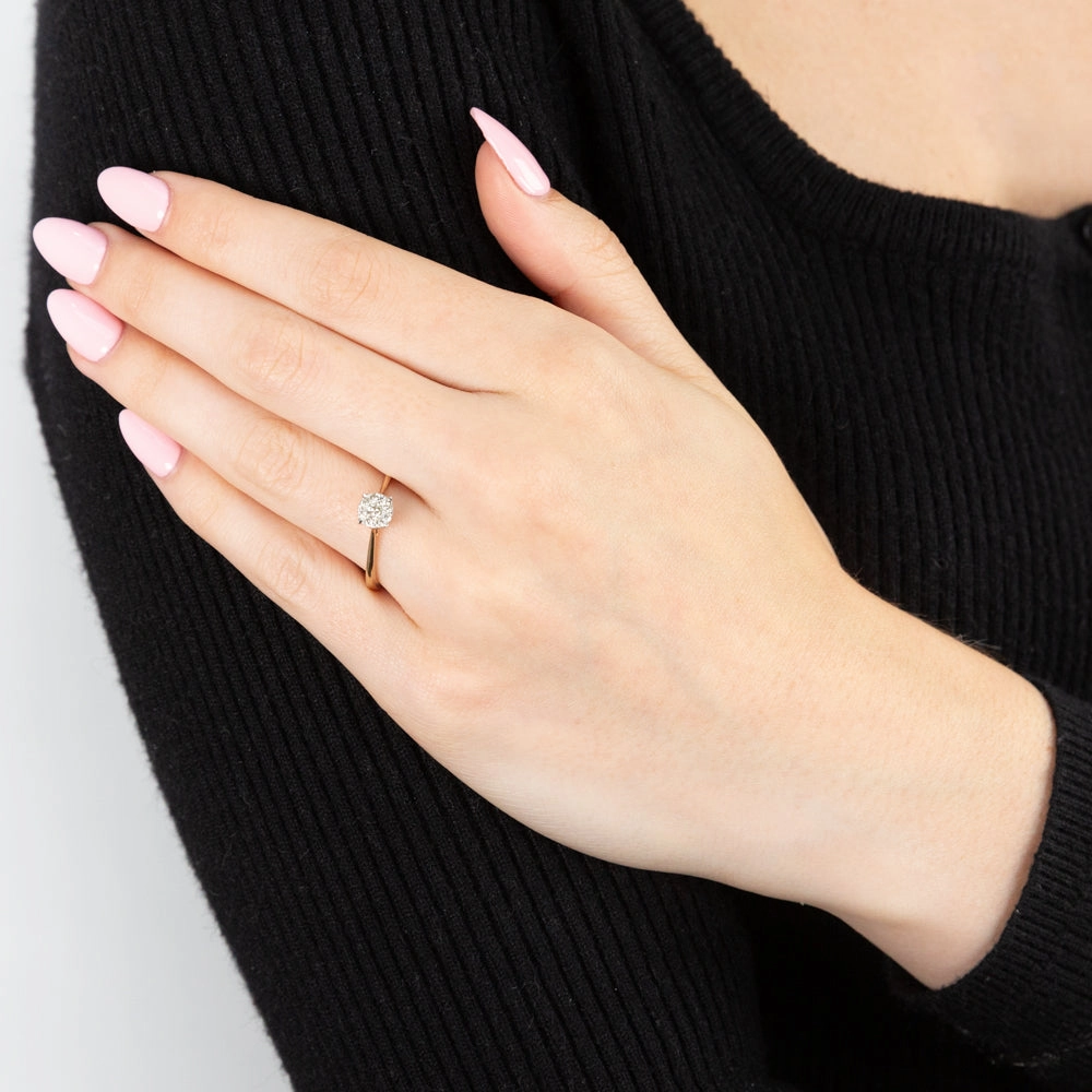 9ct Yellow Gold Ring With 1/5 Carats Of Diamonds and Infinity Detail on Side Profile