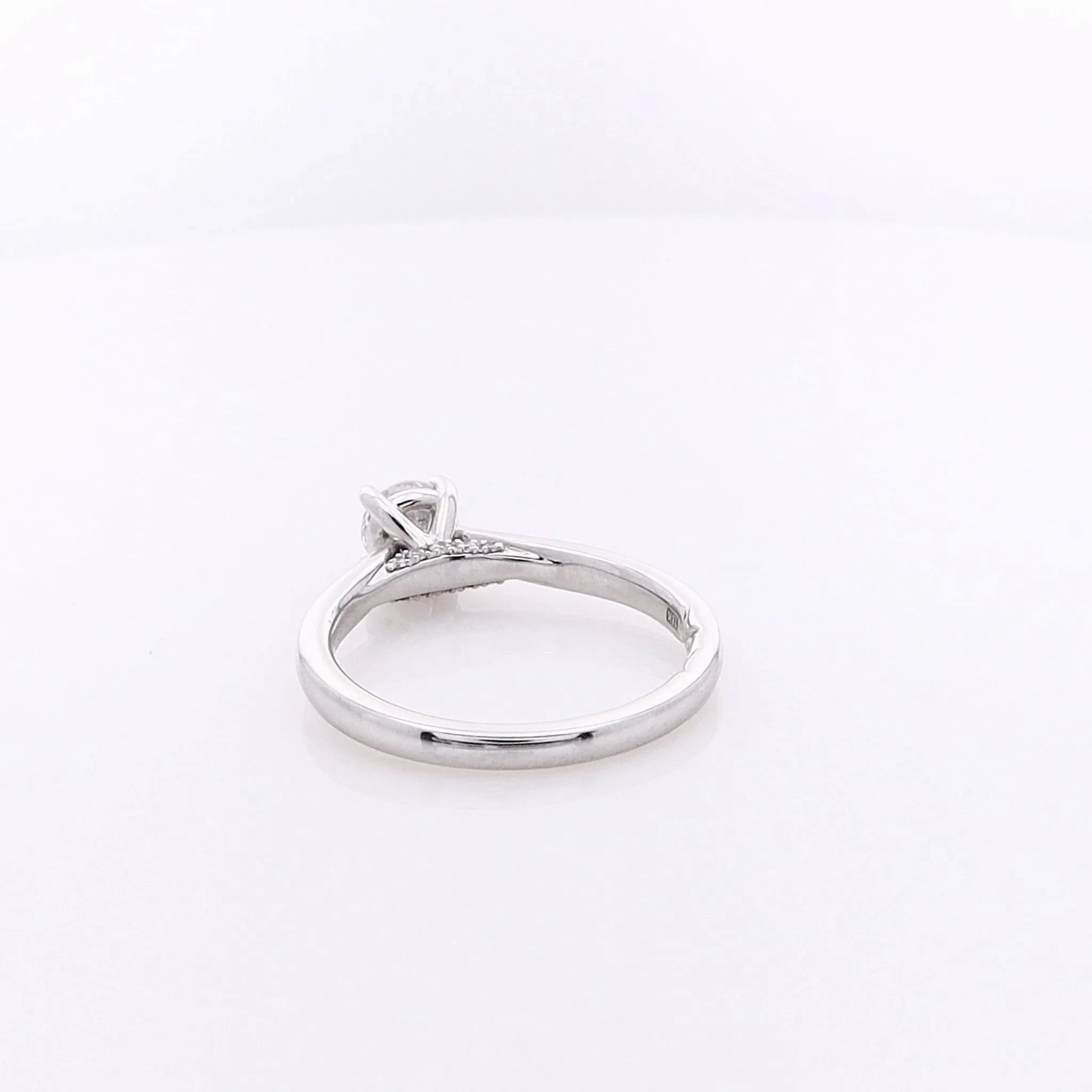 Estate A Jaffe 18 Karat White Gold Solitaire Cubic Zirconium and Diamond Under Gallery Ring