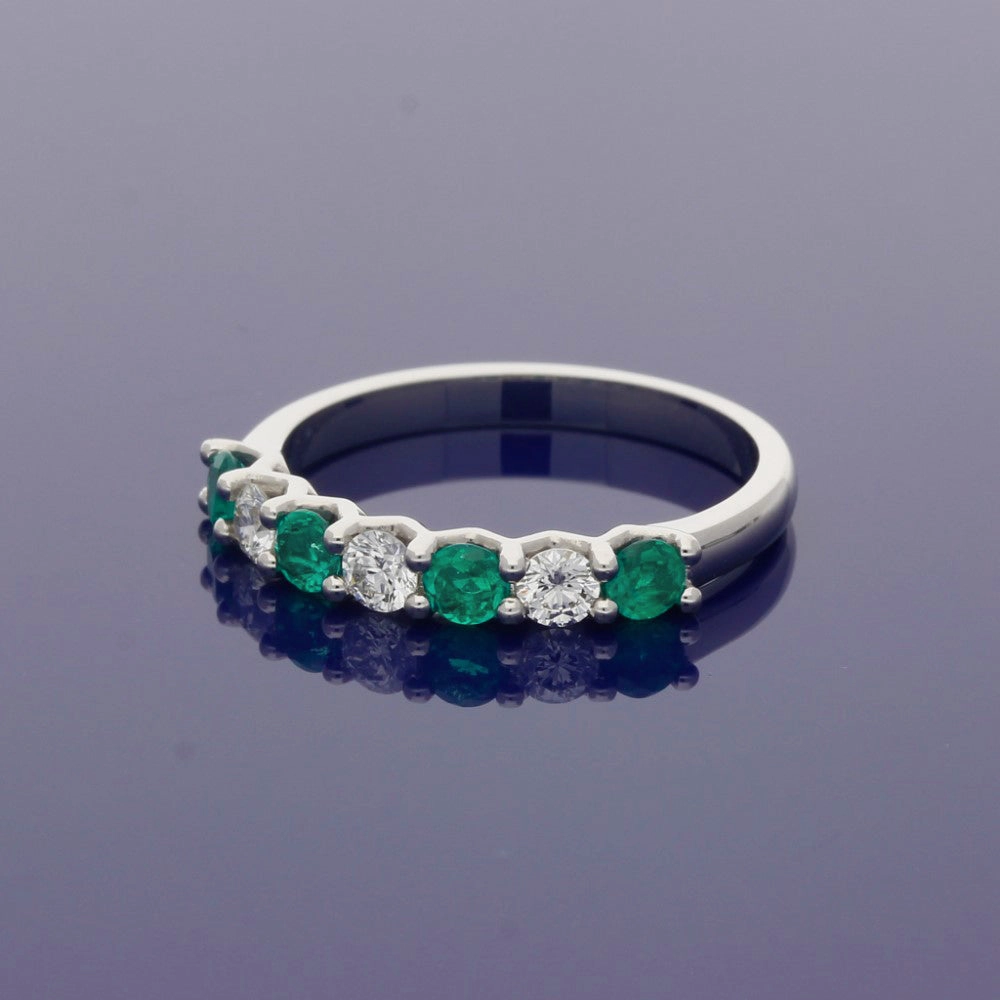 Platinum Emerald and Diamond 7 Stone Ring