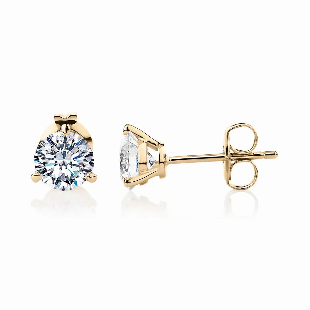 Round Brilliant stud earrings with 1.52 carats* of diamond simulants in 10 carat yellow gold