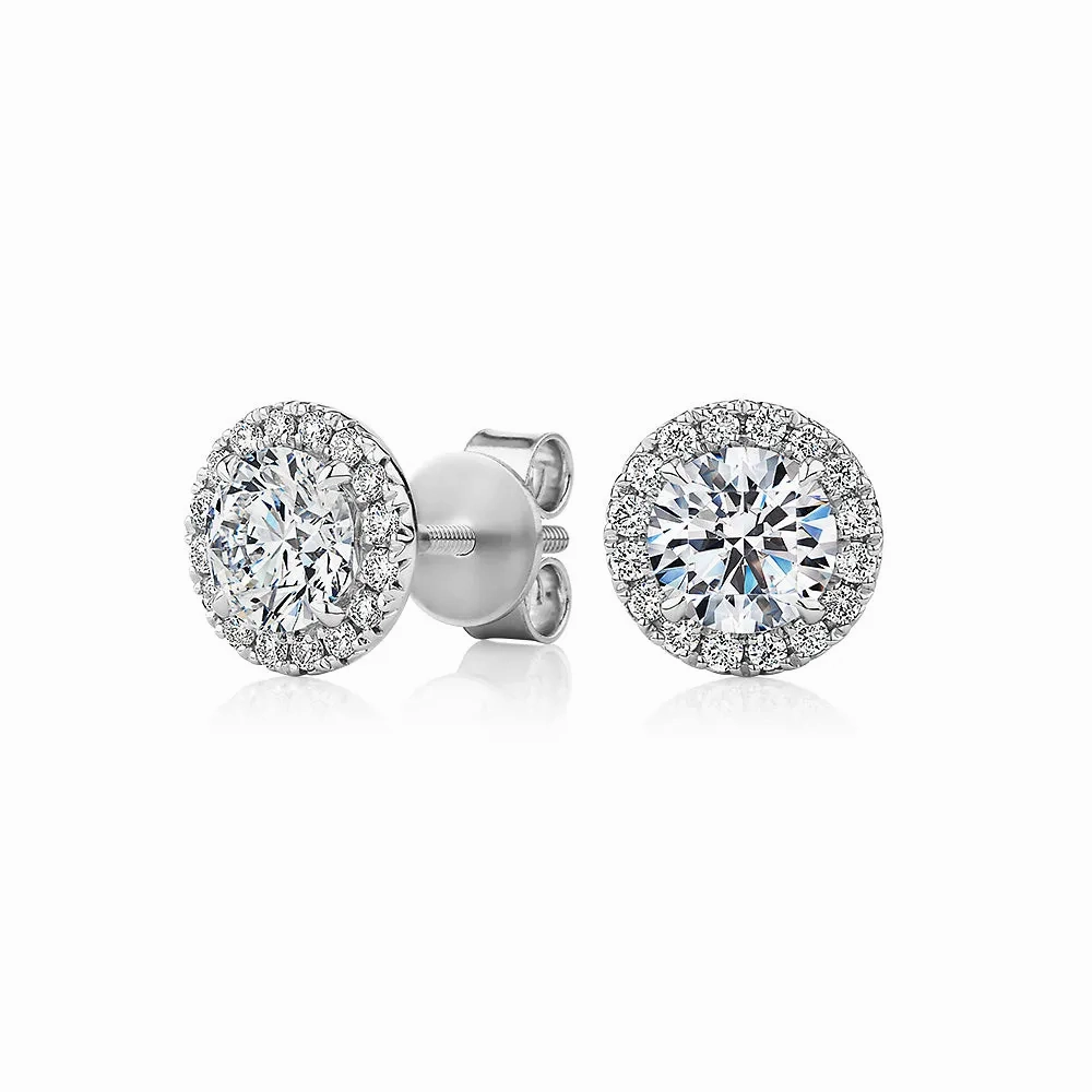 Signature Simulant Diamond 1.67 carat* TW round brilliant halo earrings in 14 carat white gold